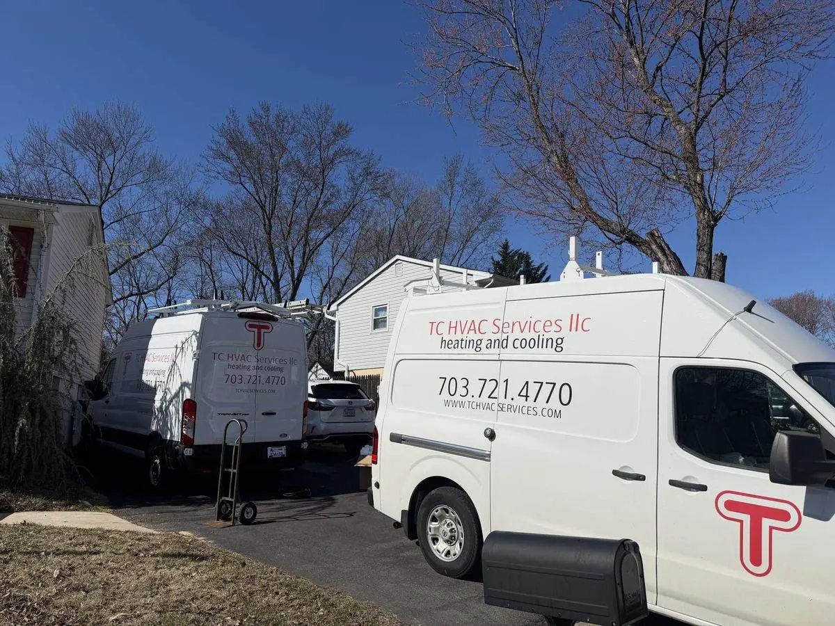 TC HVAC Services branded van serving a Northern Virginia neighborhood